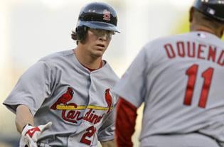 Rasmus, relievers lead Cards over Pirates