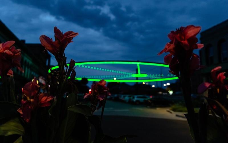 Downtown Bloomington Lights Up Green in Celebration of Illinois Wesleyan Homecoming 2026