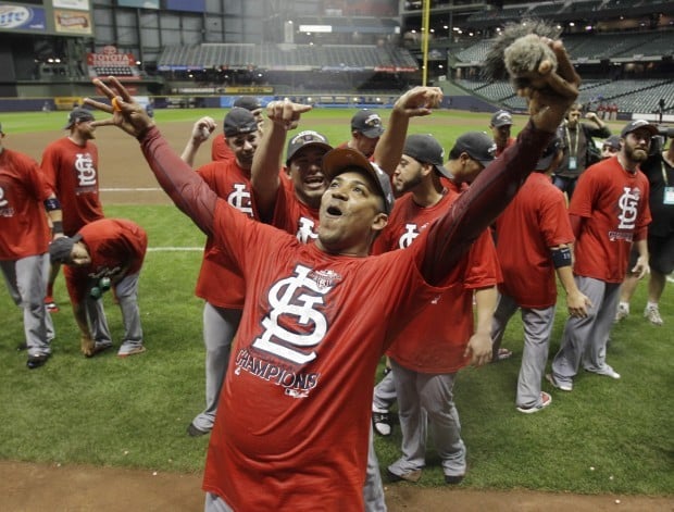 St. Louis Cardinals Manager Tony La Russa embraces Albert Pujols