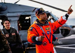 Circling the moon, a Black astronaut inspires millions