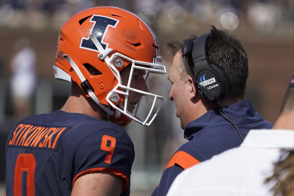 Syracuse uniforms: Orange helmets, blue jerseys & pants vs. Holy