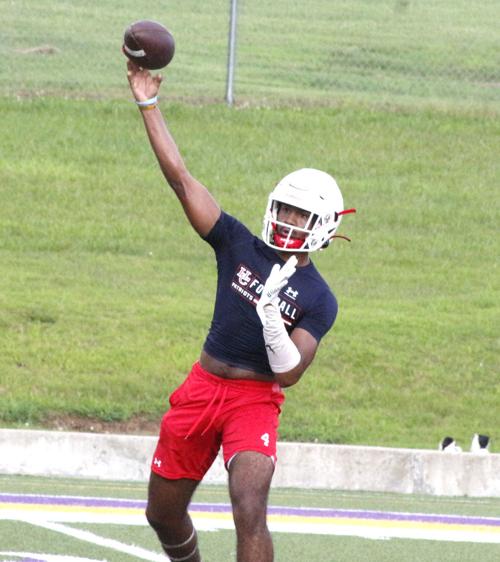 Marshall tosses a pass