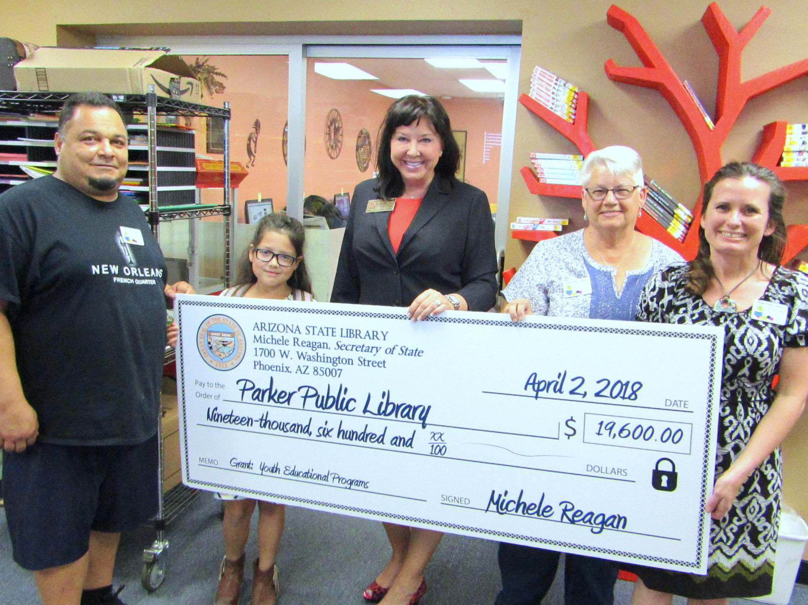 Secretary of State presents check to Parker Library News