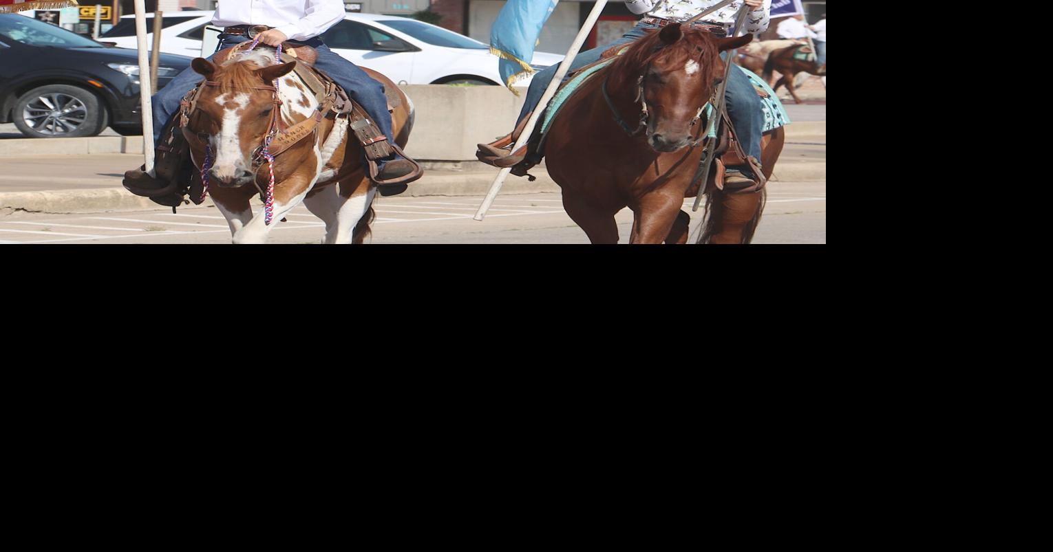 Rodeo parade rides through town