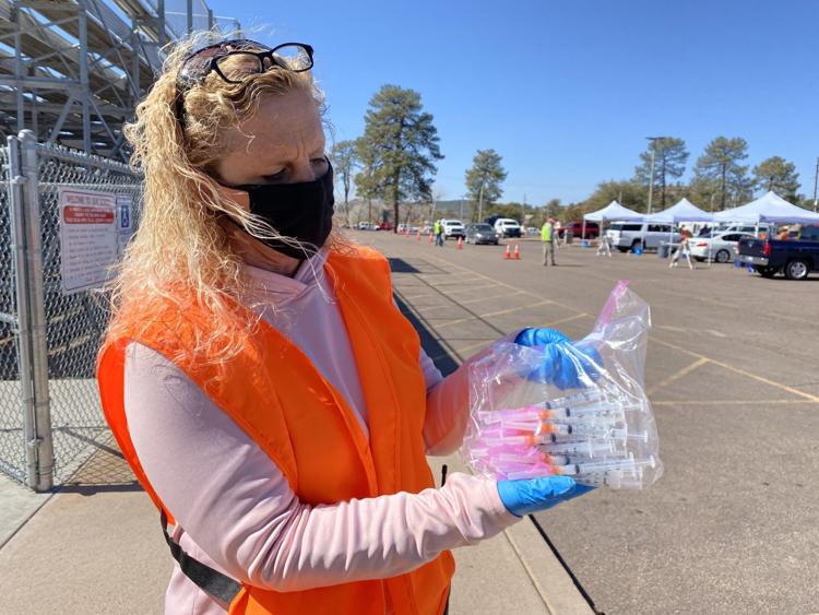 Paula Horn Dept Dir of Gila Health with filled vials