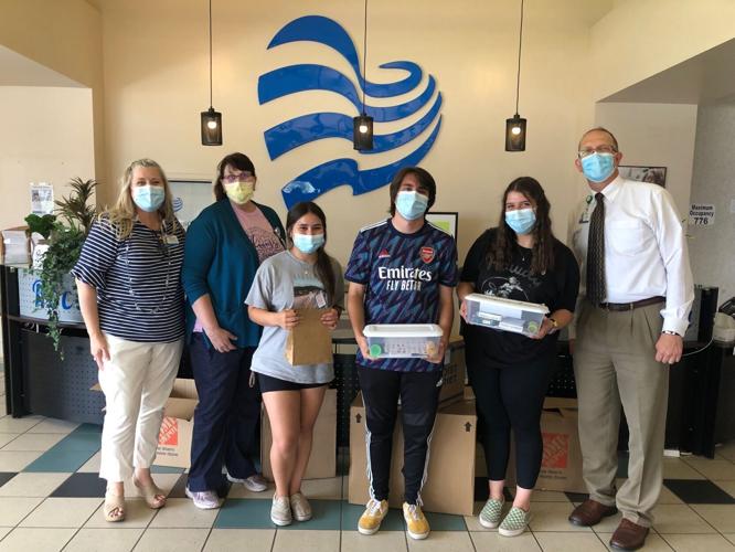 Student volunteers help pediatric patients and visitors at Banner