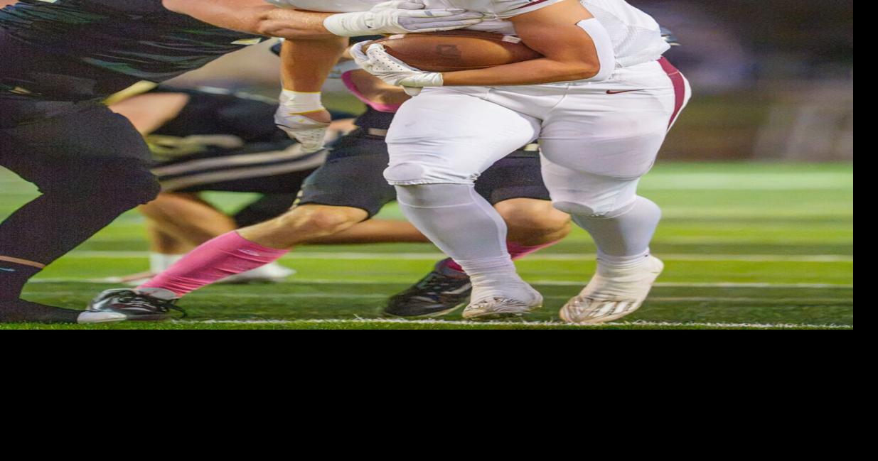 Titans rout Boonville and clinch share of PAC football division title