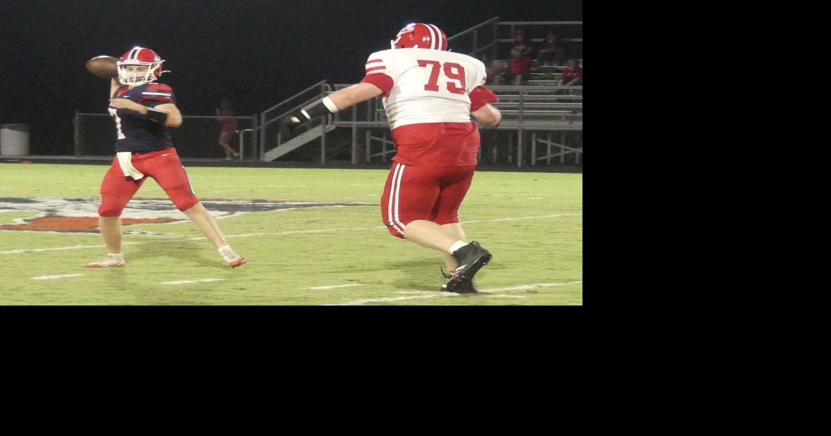 Walynn Taylor pursues the quarterback