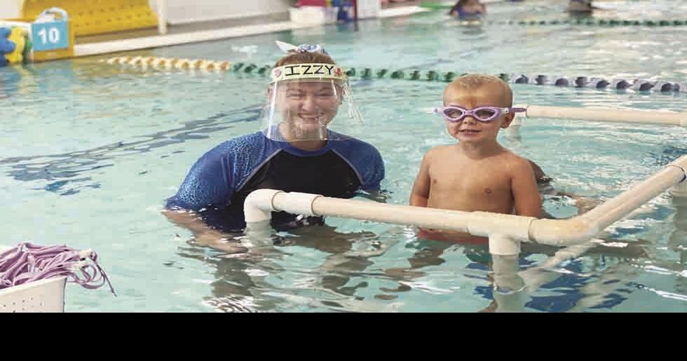 Young ones learn water safety at Hubbard Family Swim School Features