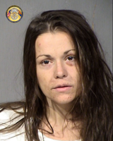 Woman arrested in connection with homicide