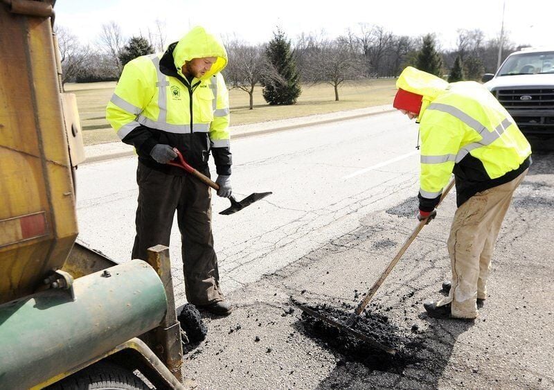 Area crews working to patch pesky potholes | News | pharostribune.com