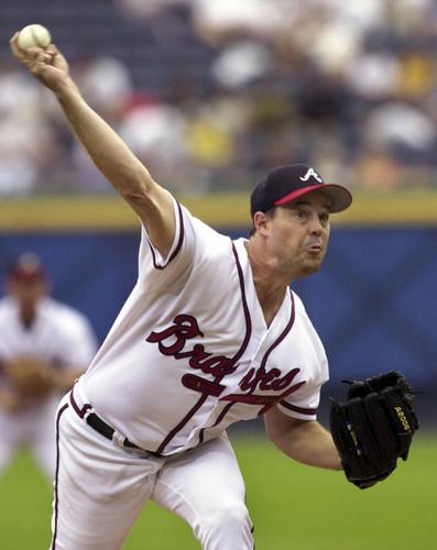 San Diego Padres starting pitcher Greg Maddux reacts to giving up