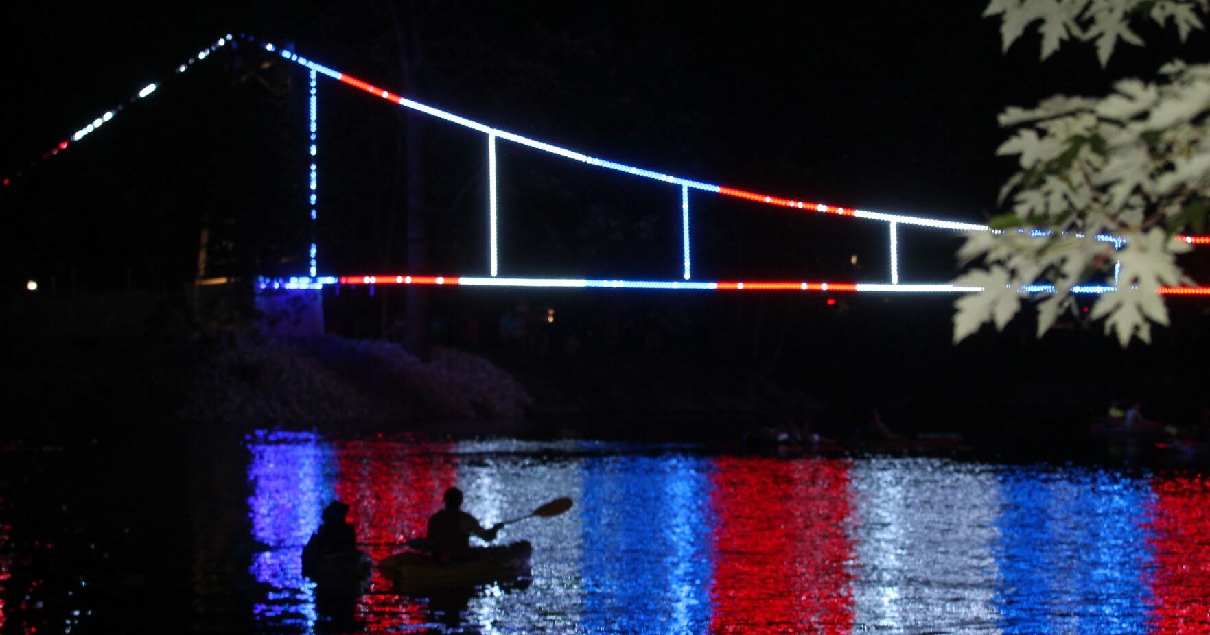 Winamac celebrates rededication, lighting of Memorial Swinging Bridge - Vimarsana News