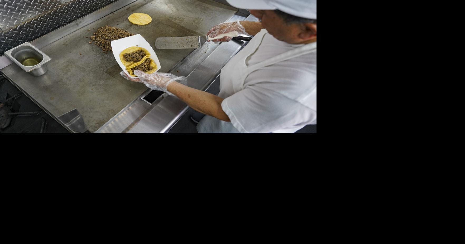 PHOTOS El Taquito Feliz food truck prepares their popular dishes