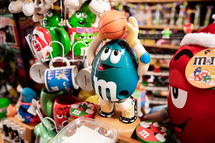 View of the M&M's anthropomorphized candy characters that have gotten a  redesigned look, stamped on a retail store purchase container, New York,  NY, January 21, 2022. Brown M&M character has been designed