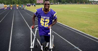Faith drives high school football player with cerebral palsy ...