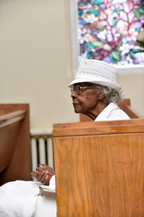 A member of the congregation listens to the Word.