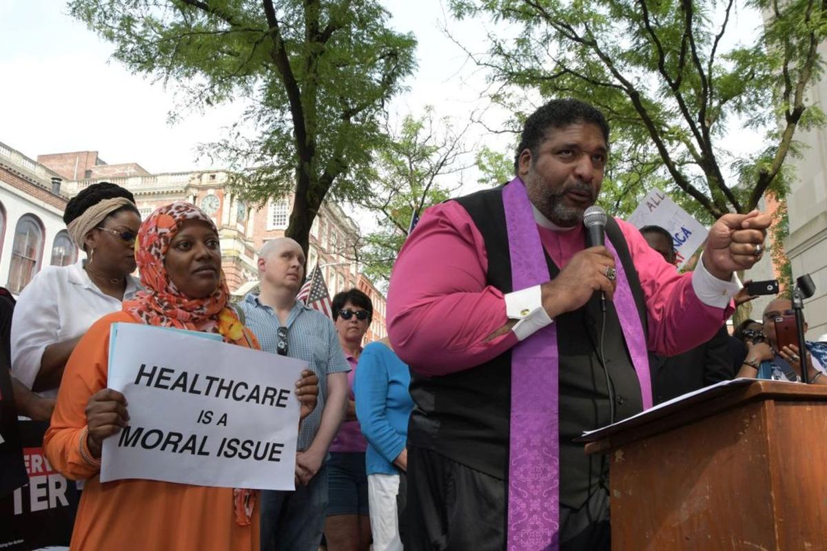 Civil rights leader protests GOP health bill at Toomey ...