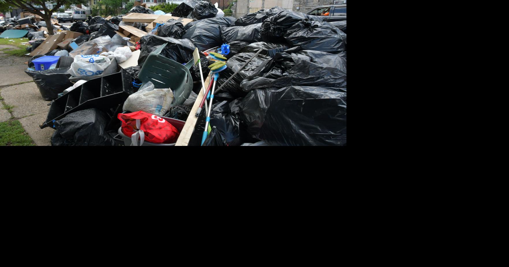 Trash piles for blocks: Work begins to clean up mounting garbage that ...