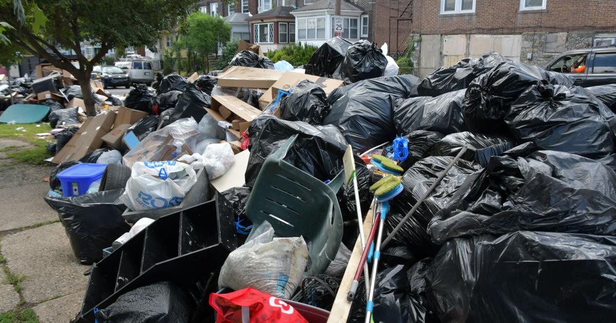 Philadelphia Garbage Problems Trash piles for blocks: Work begins to clean up mounting garbage that ...