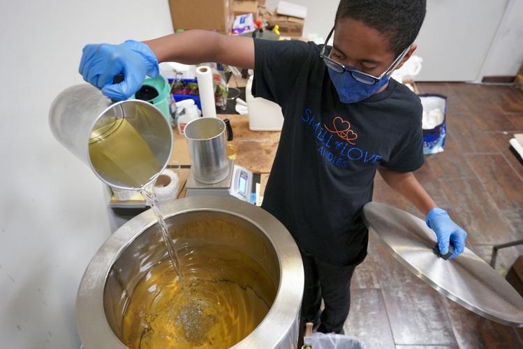 Boy's bright idea to help mom turned into his own candle business