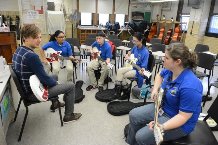 Students hitting all the right notes in new electric guitar class