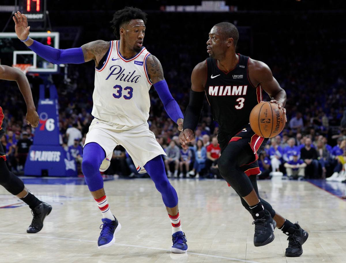 Without Embiid, 76ers roll past Heat in playoff opener ...