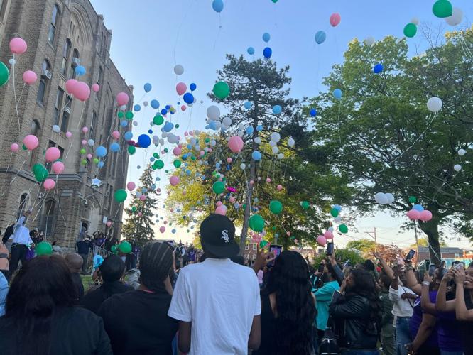 Students, family and colleagues gather at Olney High School to remember