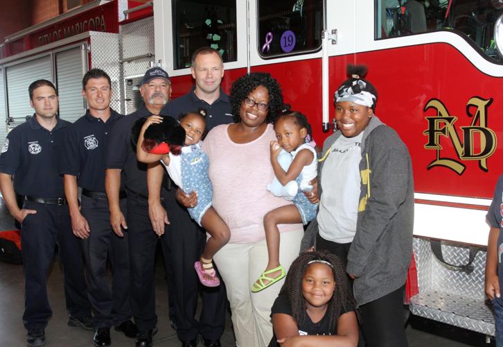 Firefighters reunite with twins | News | pinalcentral.com