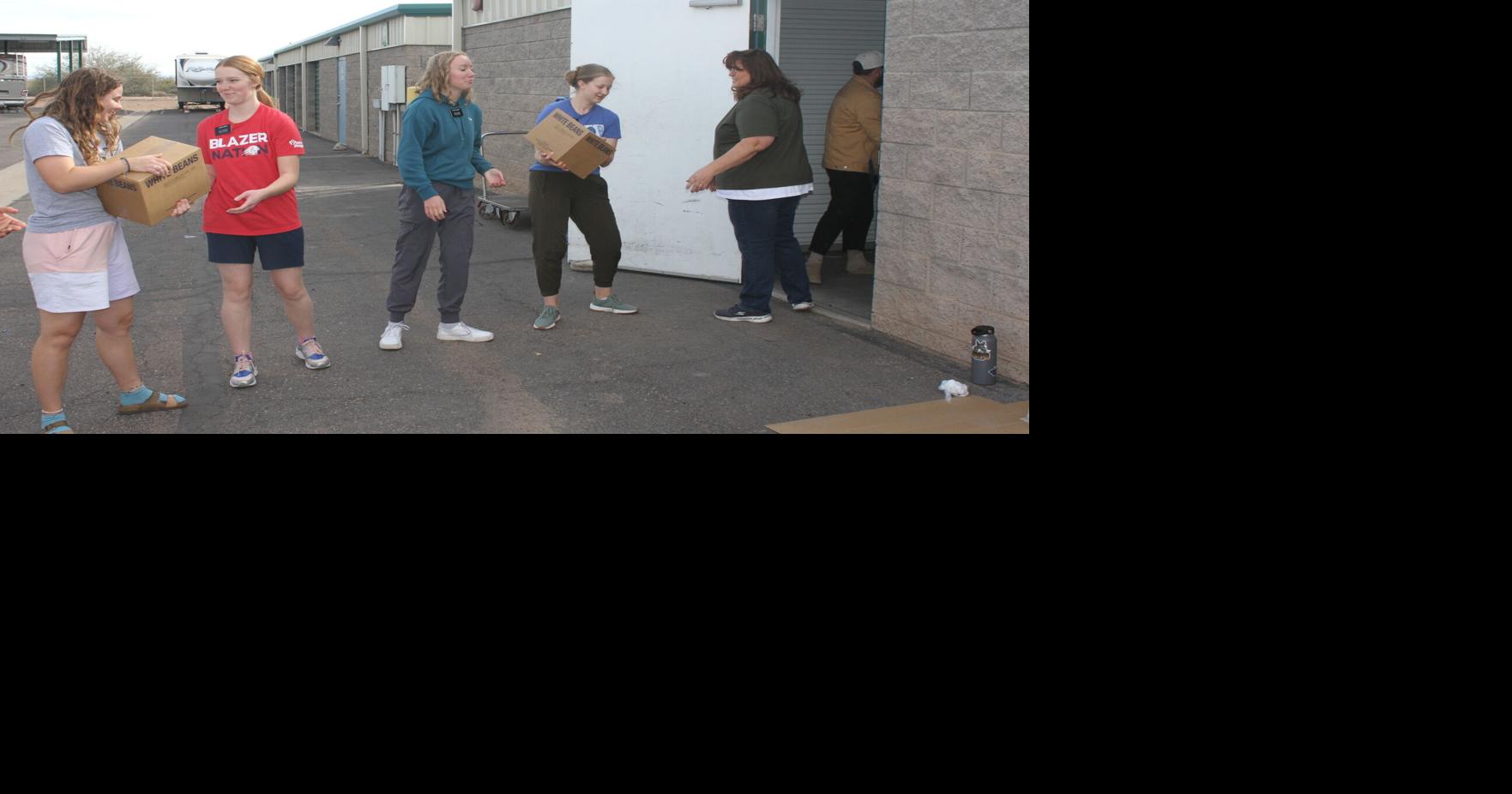 Coolidgebased LDS missionaries help put away 24,000lb load of food