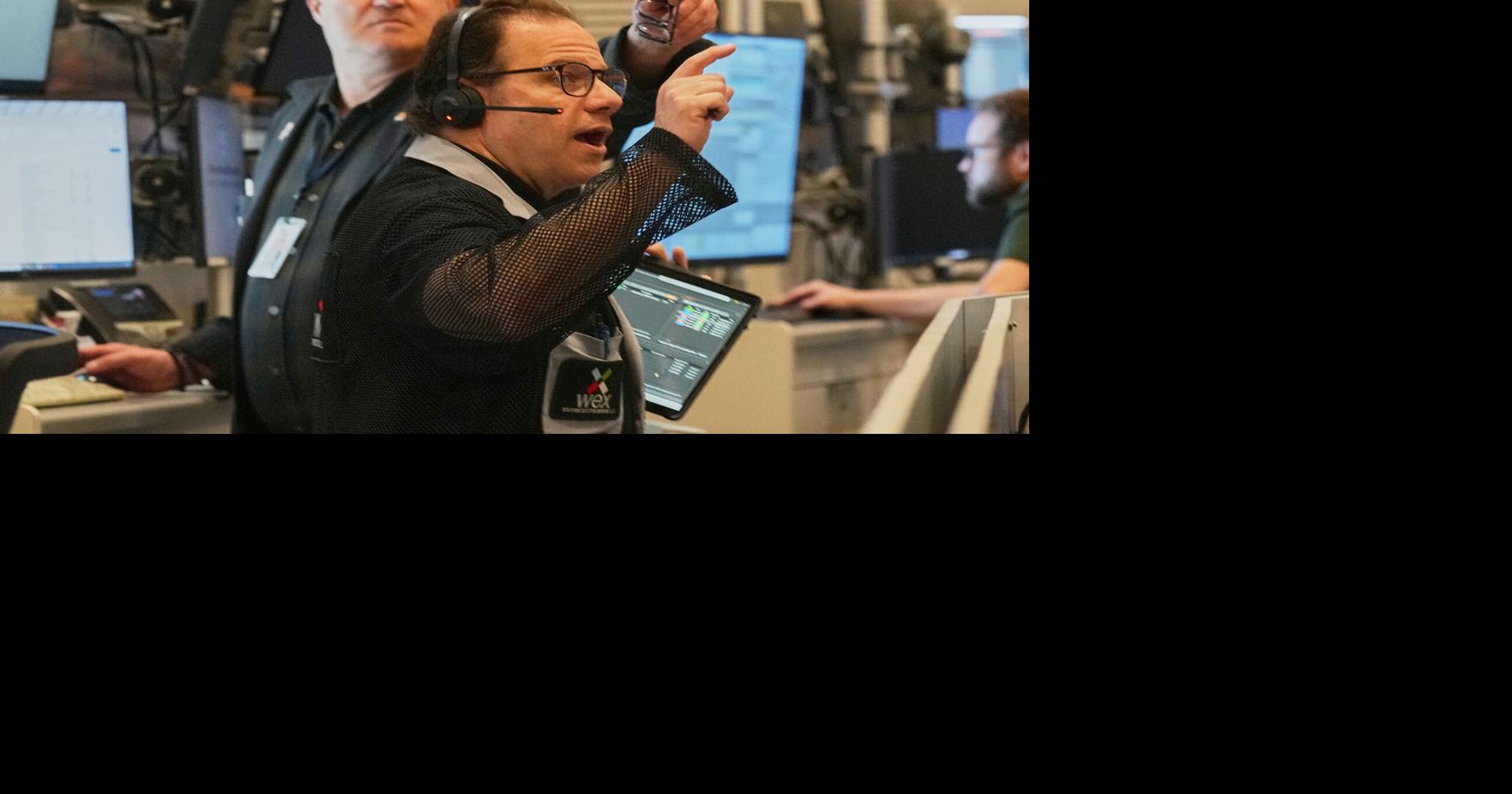 Wall Street falls from its records and oil prices jump after fighting flares in the Middle East