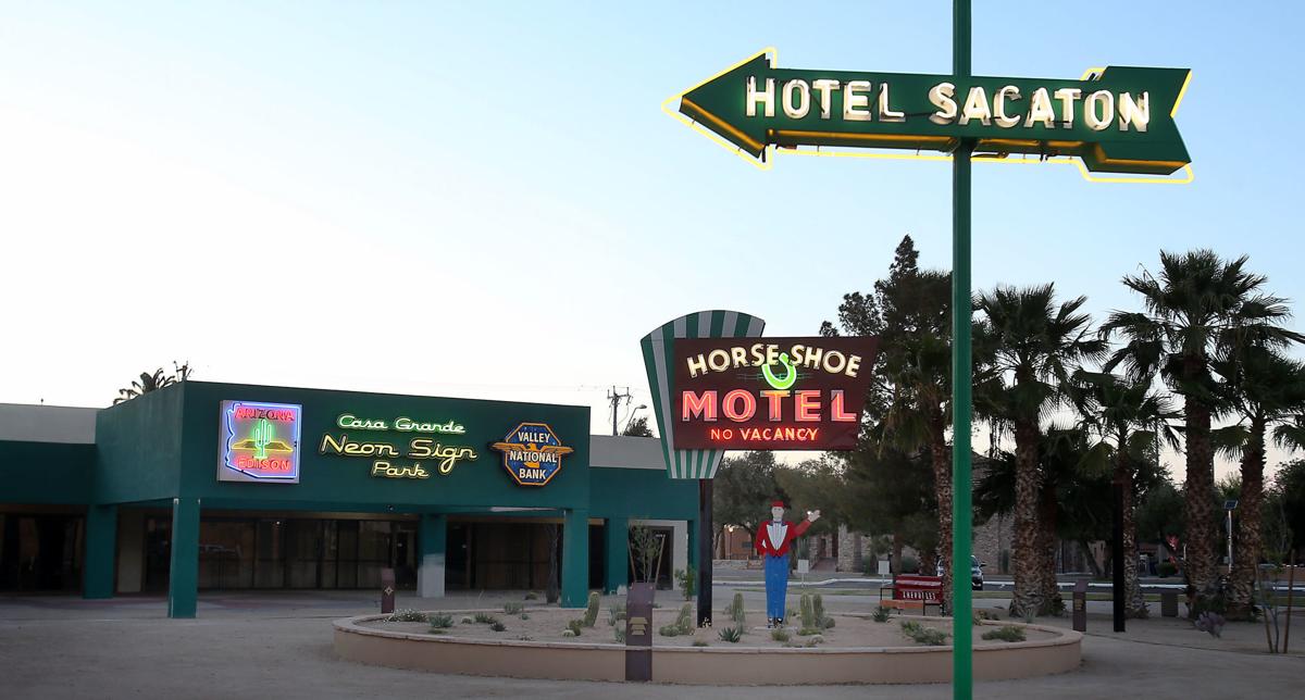 Let there be light New neon sign park now illuminates downtown Area