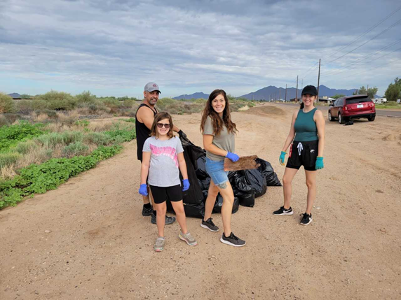 Community members collecting trash