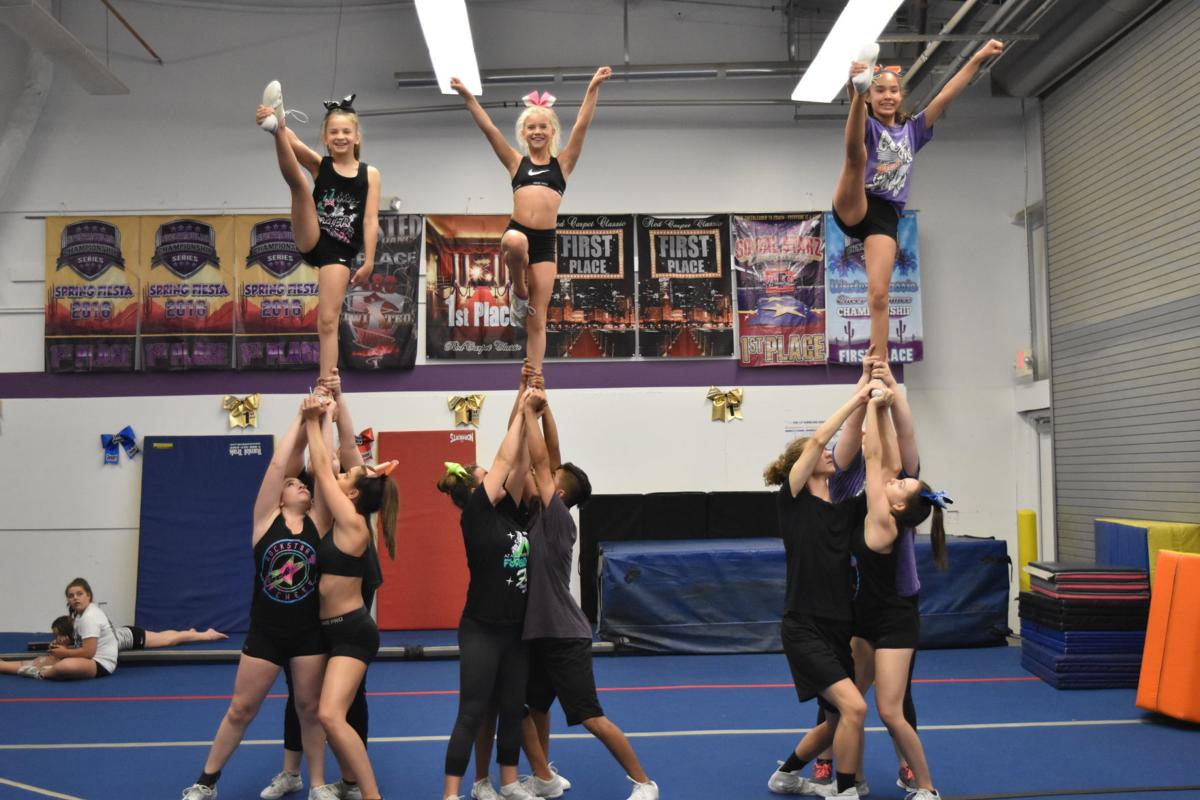 Gym closure doesn't keep Rockstar Cheer from reaching high ...