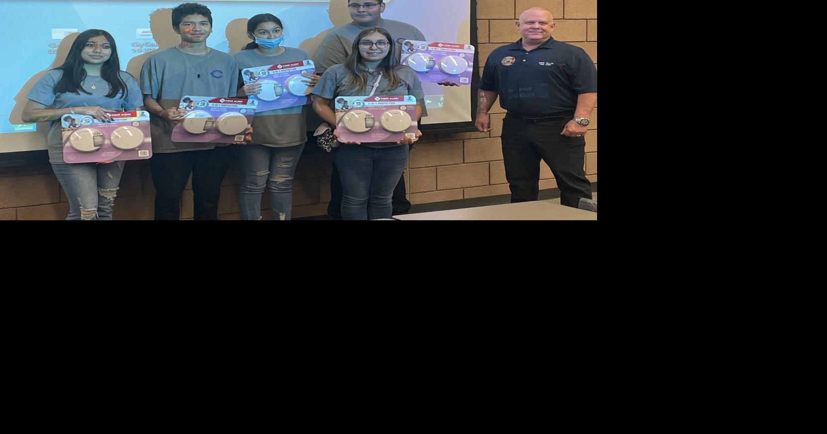 SADD/STAND Youth Coalition presents smoke detectors for the community