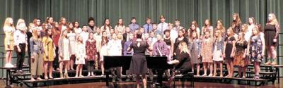 Eighth grade choir lift voices for Pine City