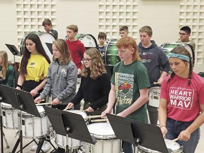 Junior High drummers get into the beat