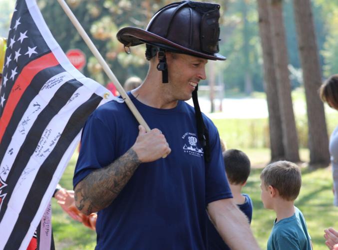 Kyle Codey Firefighter Firefighters pass through Pine County on 150-mile walk, bringing ...