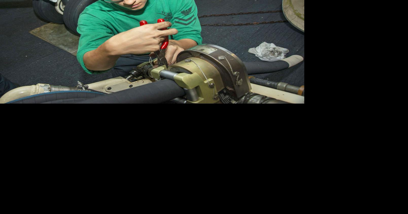 Navy mechanic Pine City Pioneer