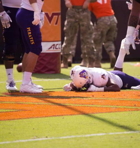 James Summers lying face down at Virginia Tech game.