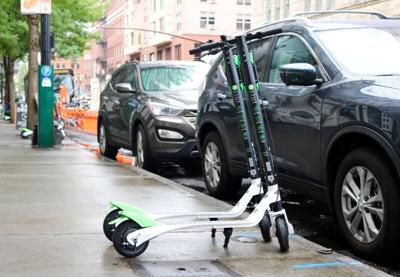 Disability org: Ban e-scooter parking blocking sidewalks