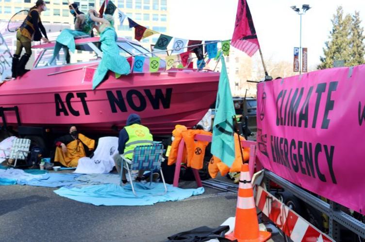Portland climate protesters block bridge ramp with boat