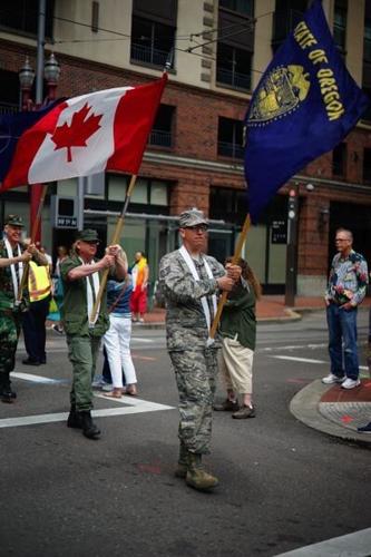 US military members march in full uniform at San Diego gay pride