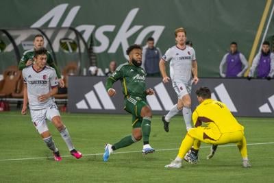 Portland Timbers midfielder Eryk Williamson chases a ball vs. St. Louis