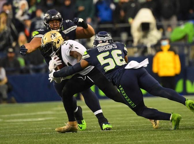 Saints snag soggy victory in Seattle 