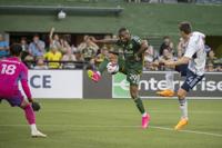 Juan Mosquera, the Timbers' new #29, dons the jersey