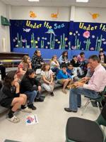 Sheriff and deputy bring music to students