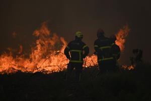 Wildfires in France drive 250,000 people from their homes and creep toward wine city of Bordeaux