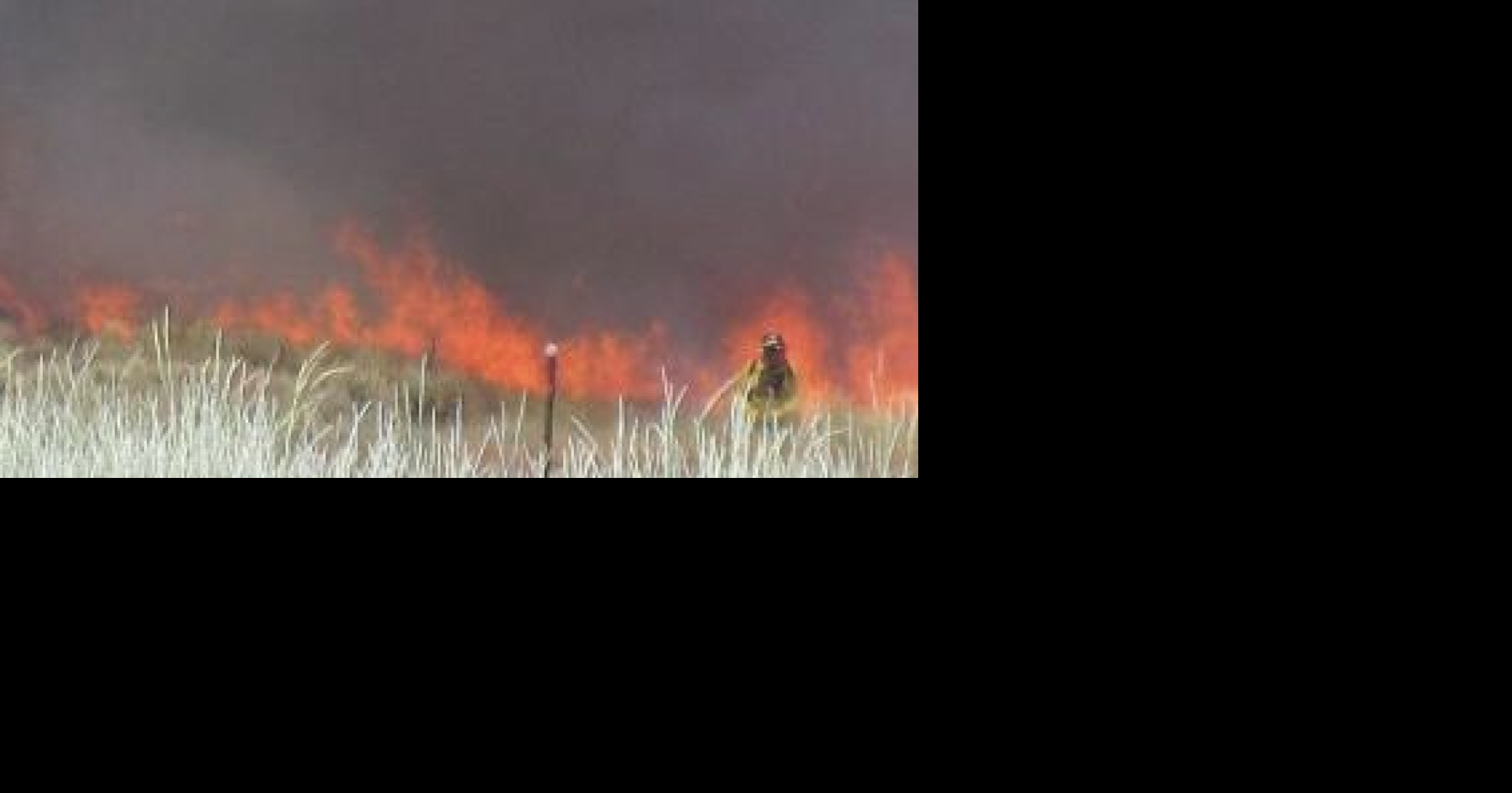 Two-vehicle crash sparks brush fire near Blackfoot that partially shuts down Highway 26