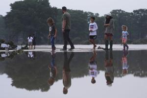 Texas floods leave at least 51 dead, 27 girls missing as rescuers search devastated landscape